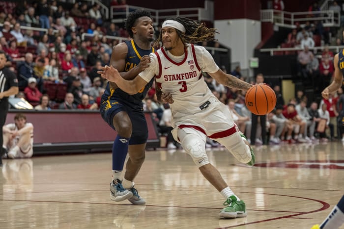 Stanford Cardinal guard Kanaan Carlyle (3) drives the lane against California Golden Bears guard Jalen Cone (15) during the second half at Maples Pavillion.